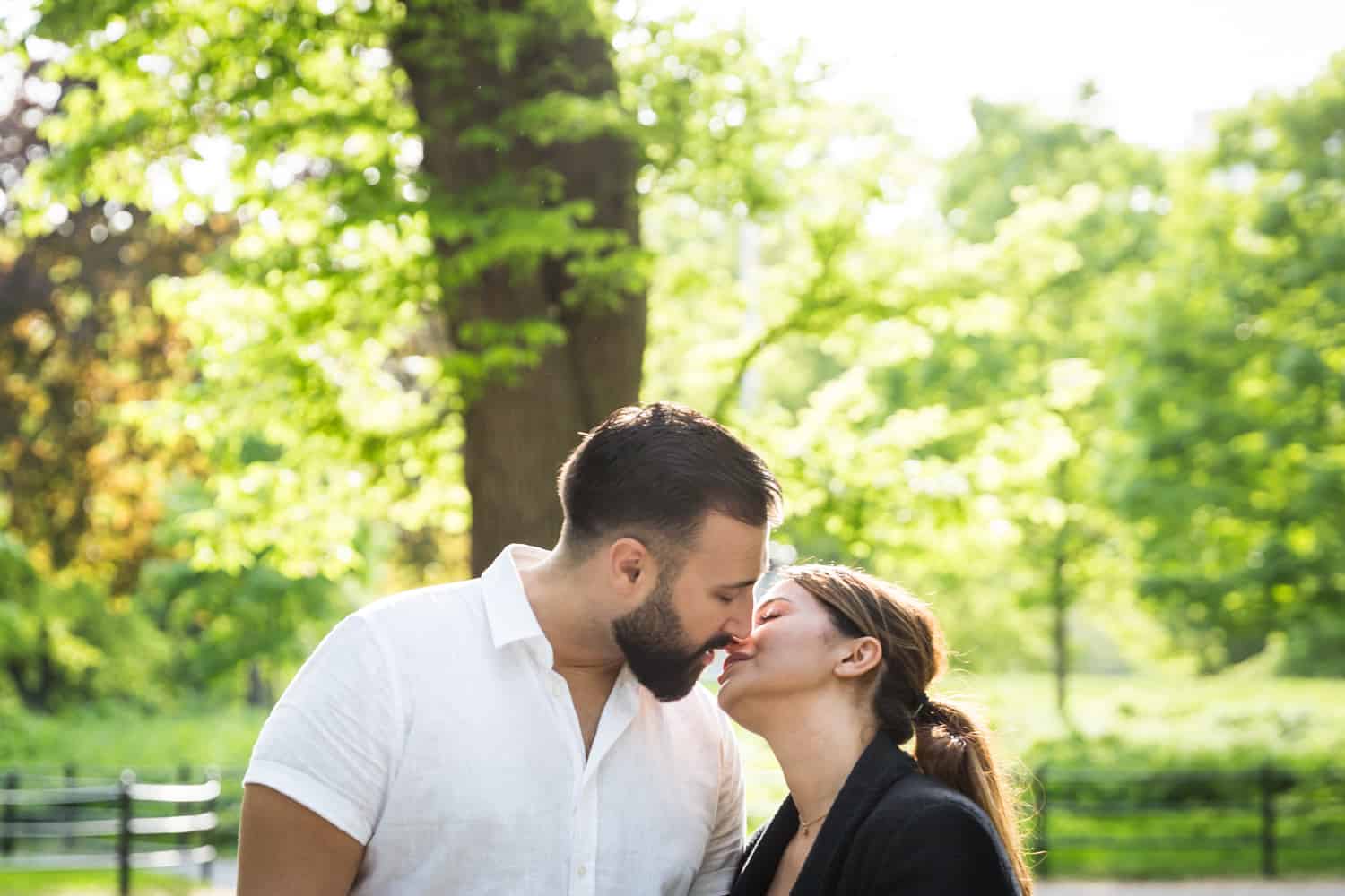 Couple about to kiss in Central Park