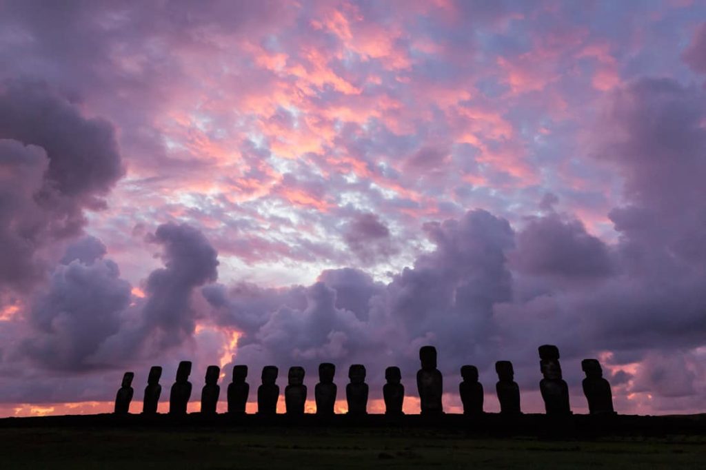 Line of moai statues at Ahu Tongariki at sunrise on Easter Island