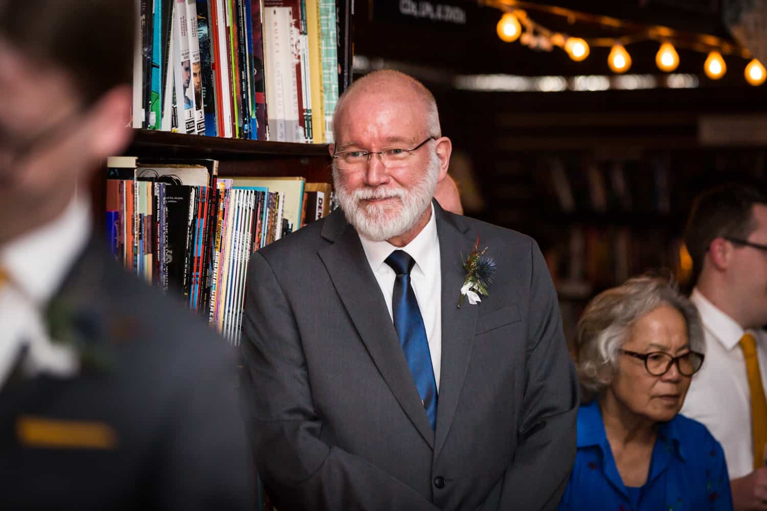 Father watching groom dance with mother at a Housing Works Bookstore Cafe wedding