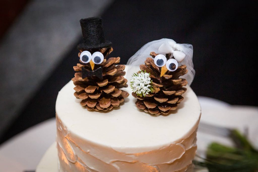 Wedding cake topper made of pine cones