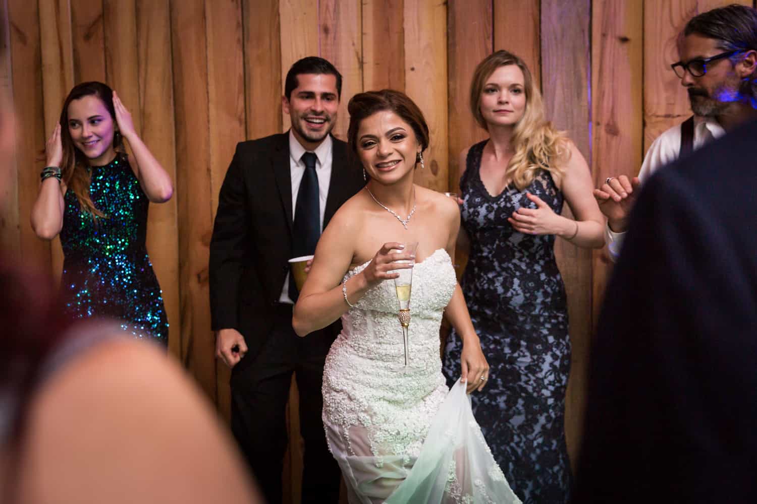 Bride dancing with guests during Florida wedding reception