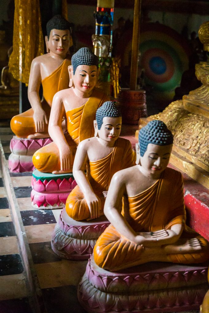 Line of buddha sculptures in Cambodia