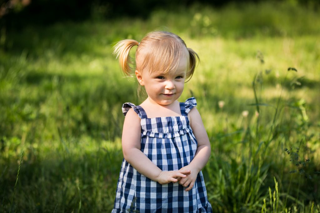 Little girl in Forest Park for an article on pandemic portrait session details