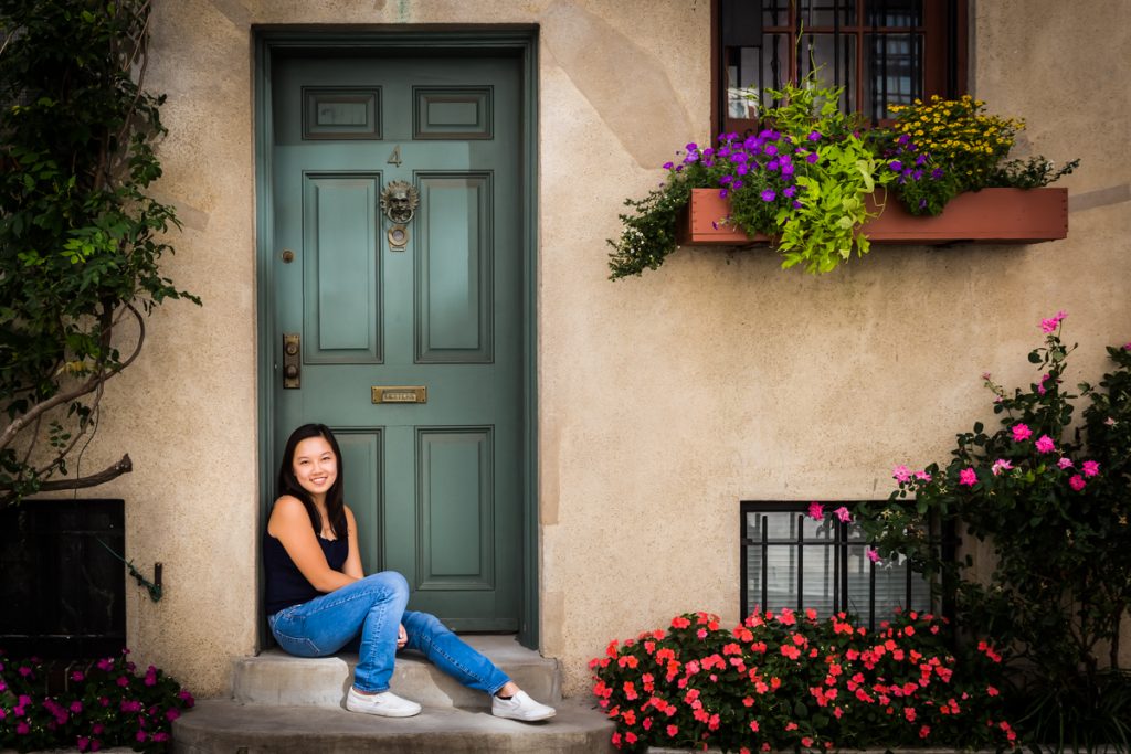 Teenager sitting in doorway for an article on photo tips for older children