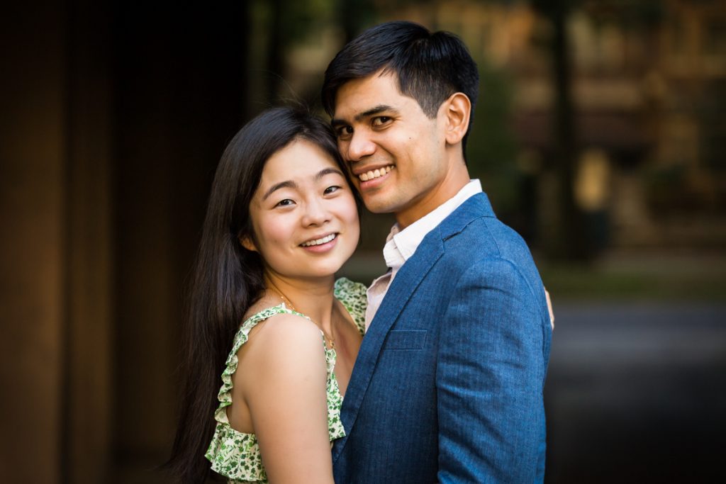Couple in dark archway during Forest Hills engagement session