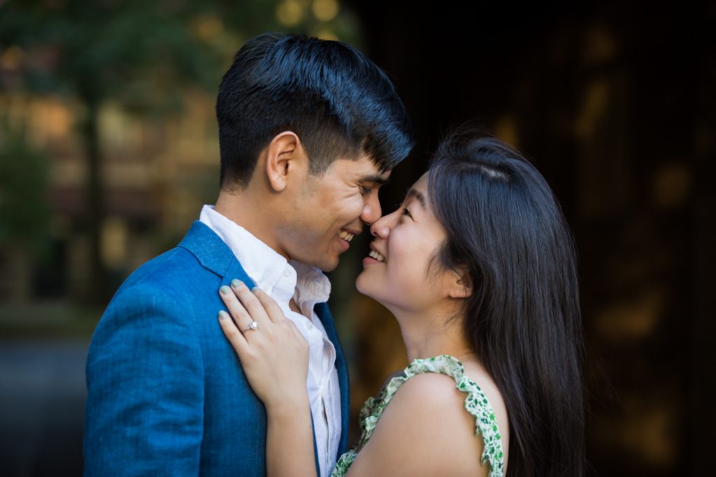 Couple looking at each other during Forest Hills engagement shoot