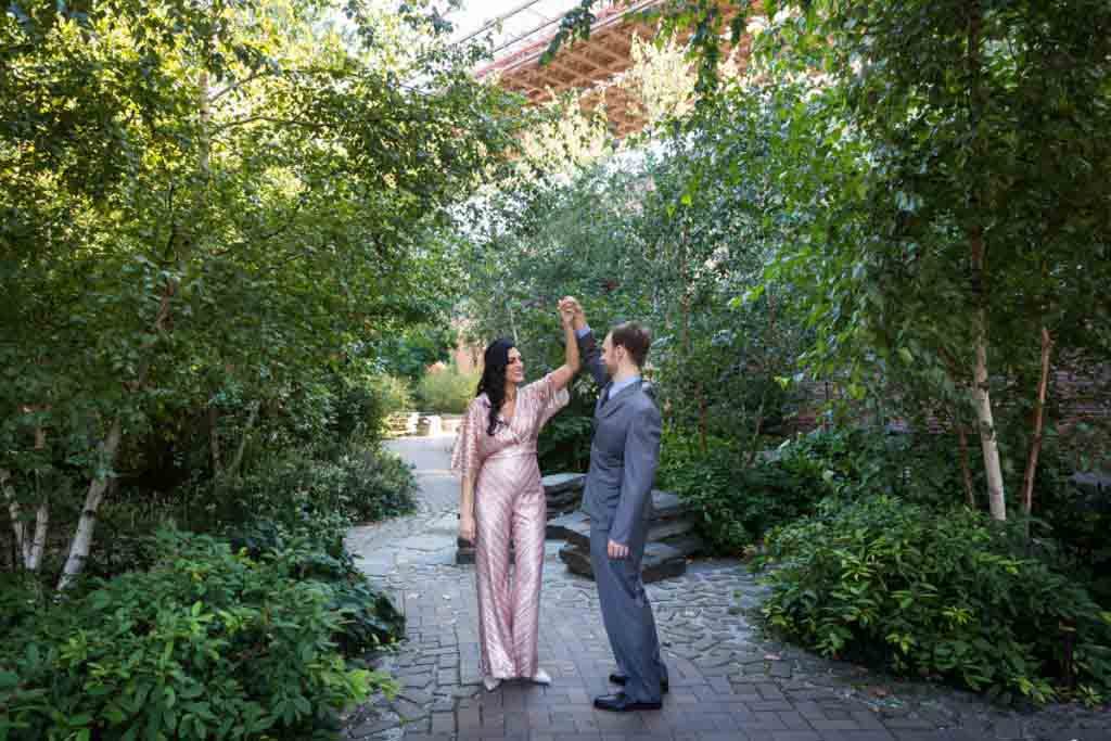 Bride and groom dancing in Max Family Garden
