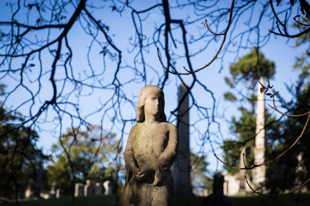 Faceless grave statue for an article on visiting Green-Wood Cemetery