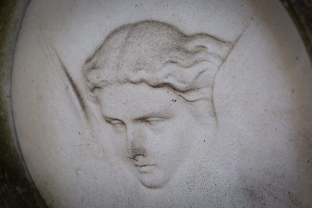 Face of woman on grave at Green-Wood Cemetery