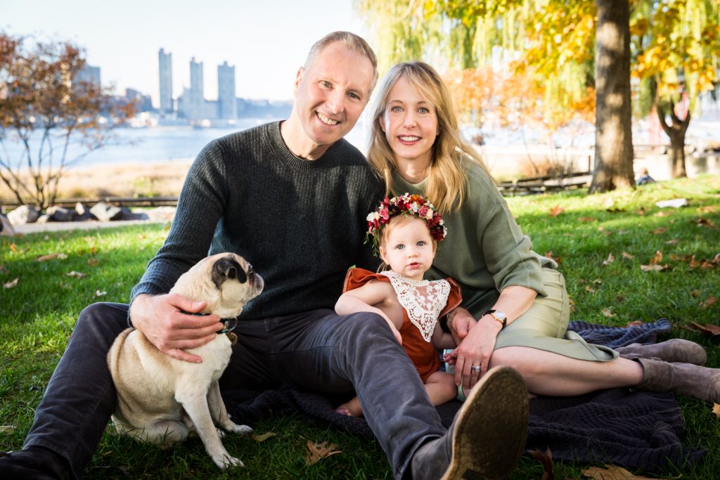 Parents, little girl and dog for an article NYC golden hour portrait tips