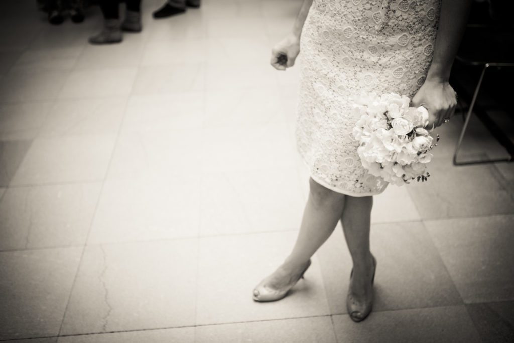 Waiting for a Manhattan Marriage Bureau wedding to take place, by NYC wedding photojournalist, Kelly Williams