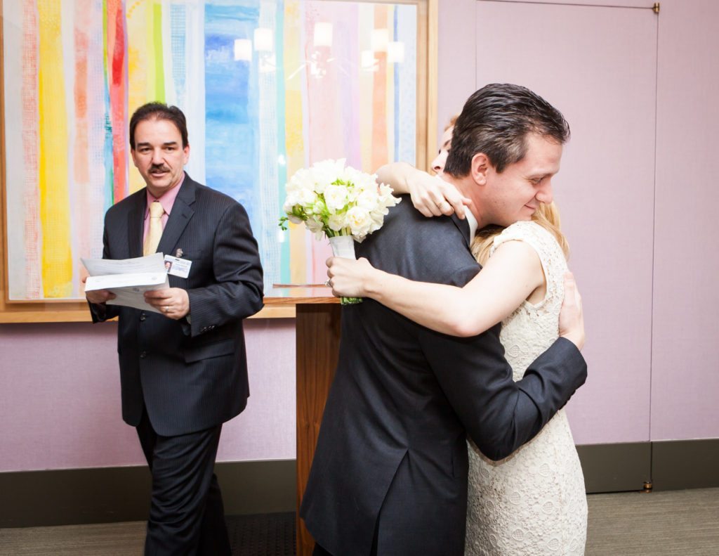 Ceremony at a Manhattan Marriage Bureau wedding, by NYC wedding photojournalist, Kelly Williams