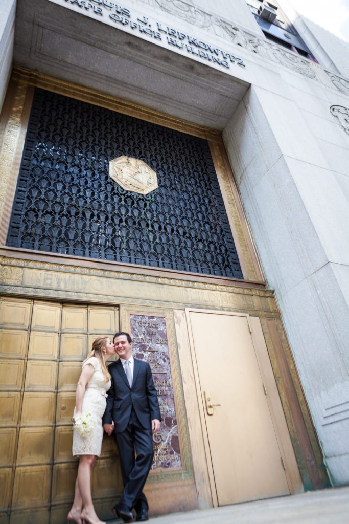 Bride and groom portrait after a Manhattan Marriage Bureau wedding, by NYC wedding photojournalist, Kelly Williams