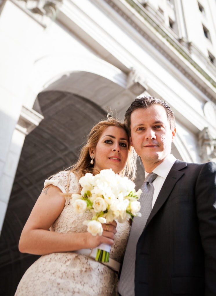 Bride and groom portrait after a Manhattan Marriage Bureau wedding, by NYC wedding photojournalist, Kelly Williams