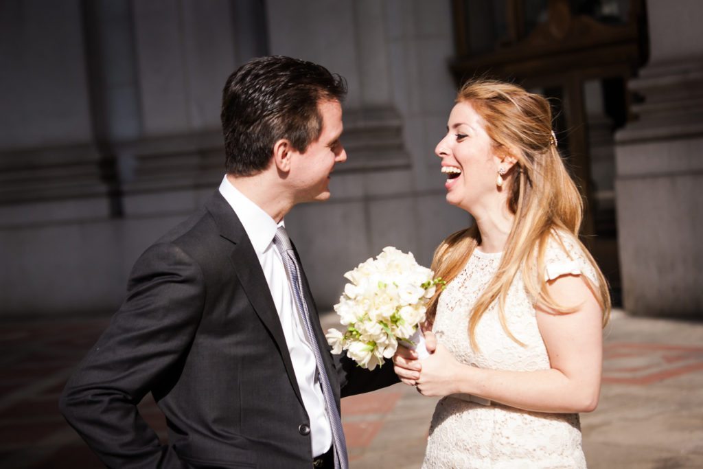 Bride and groom portrait after a Manhattan Marriage Bureau wedding, by NYC wedding photojournalist, Kelly Williams