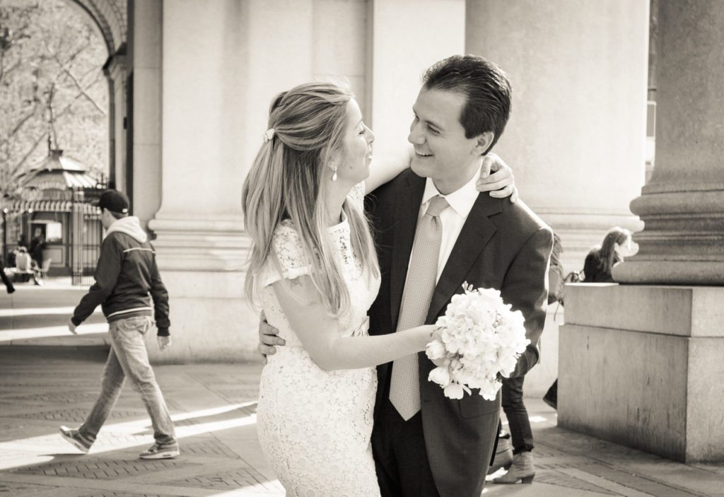 Bride and groom portrait after a Manhattan Marriage Bureau wedding, by NYC wedding photojournalist, Kelly Williams