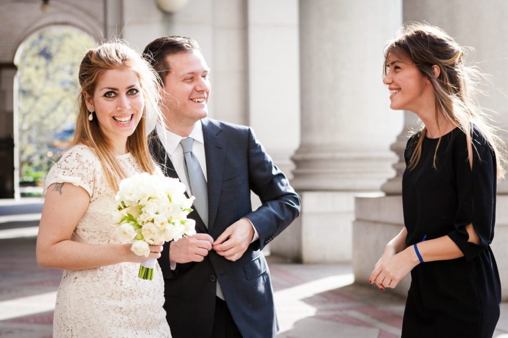 Bride and groom portrait after a Manhattan Marriage Bureau wedding, by NYC wedding photojournalist, Kelly Williams