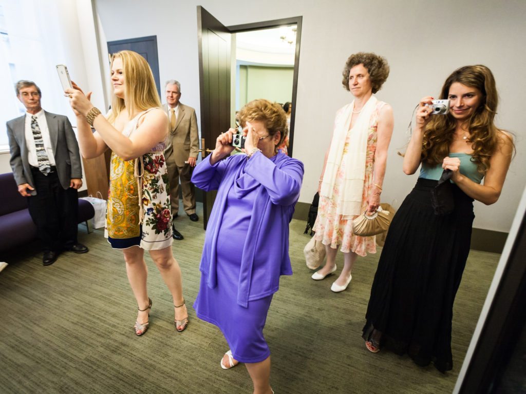 Taking photos after a NYC City Hall wedding, by Kelly Williams