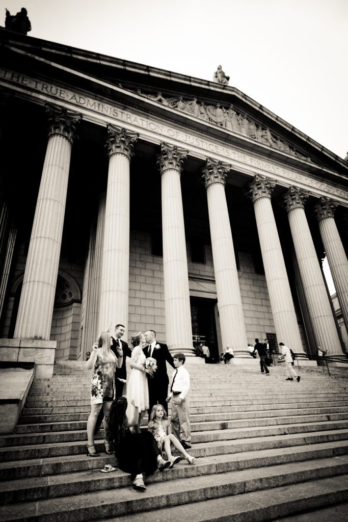 Bride and groom portrait after a NYC City Hall wedding, by Kelly Williams