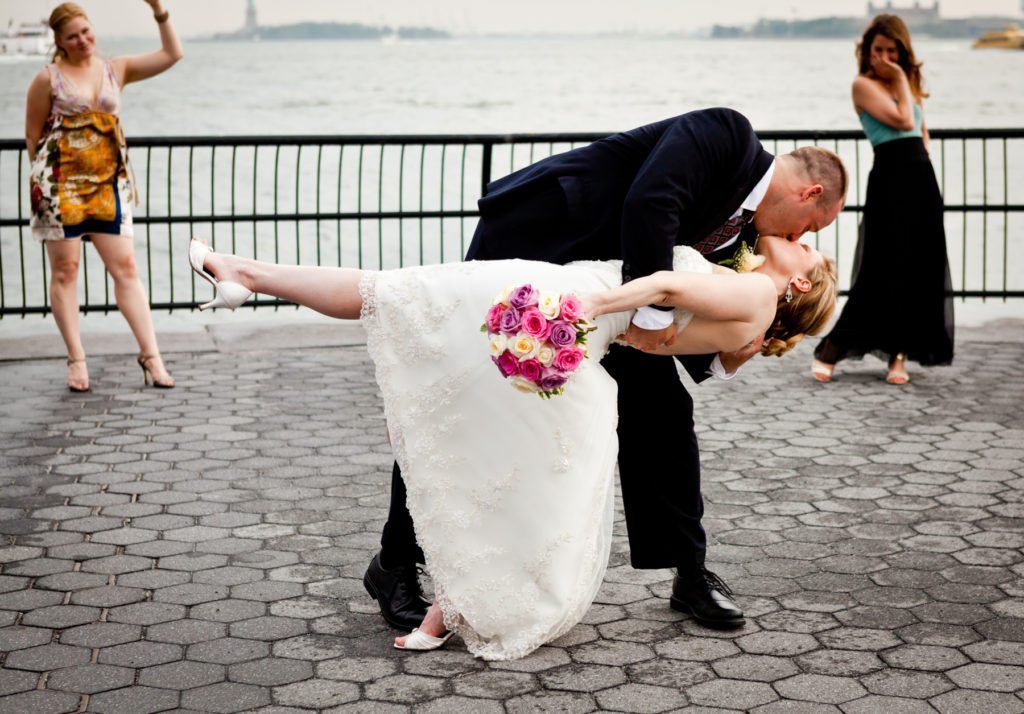Bride and groom portrait in Battery Park after a NYC City Hall wedding, by Kelly Williams
