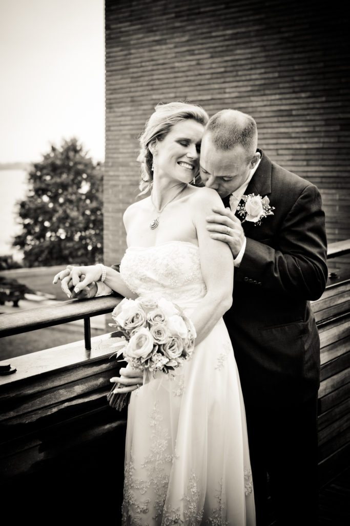 Bride and groom portrait in Battery Park after a NYC City Hall wedding, by Kelly Williams