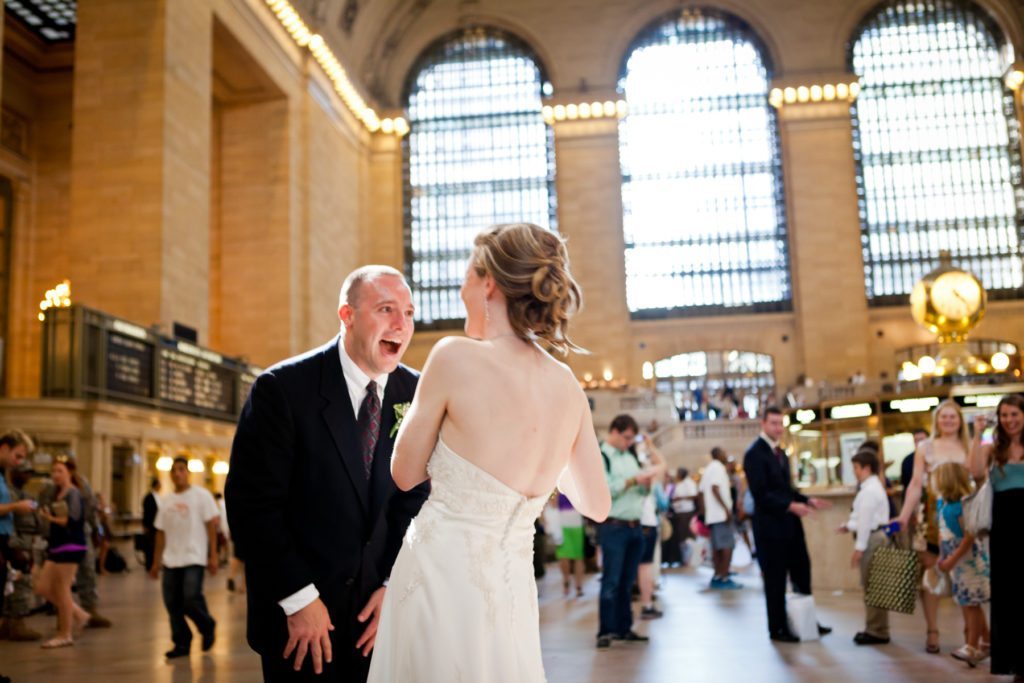 Bride and groom portrait in Grand Central after a NYC City Hall wedding, by Kelly Williams