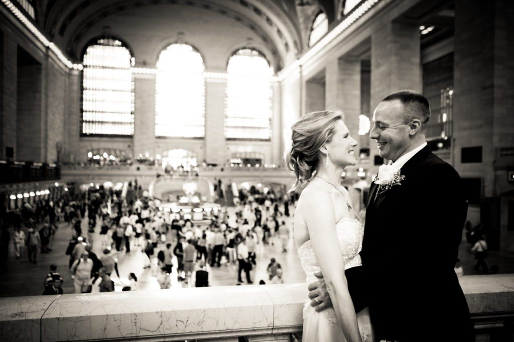 Bride and groom portrait in Grand Central after a NYC City Hall wedding, by Kelly Williams