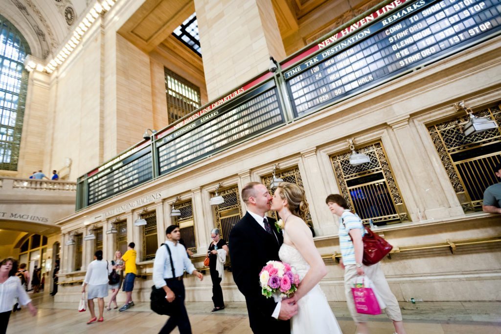 Bride and groom portrait in Grand Central after a NYC City Hall wedding, by Kelly Williams