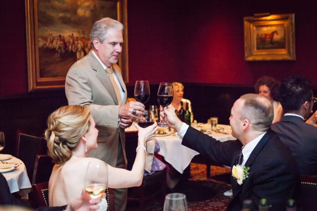 Toast at a Capital Grill wedding reception, by Kelly Williams