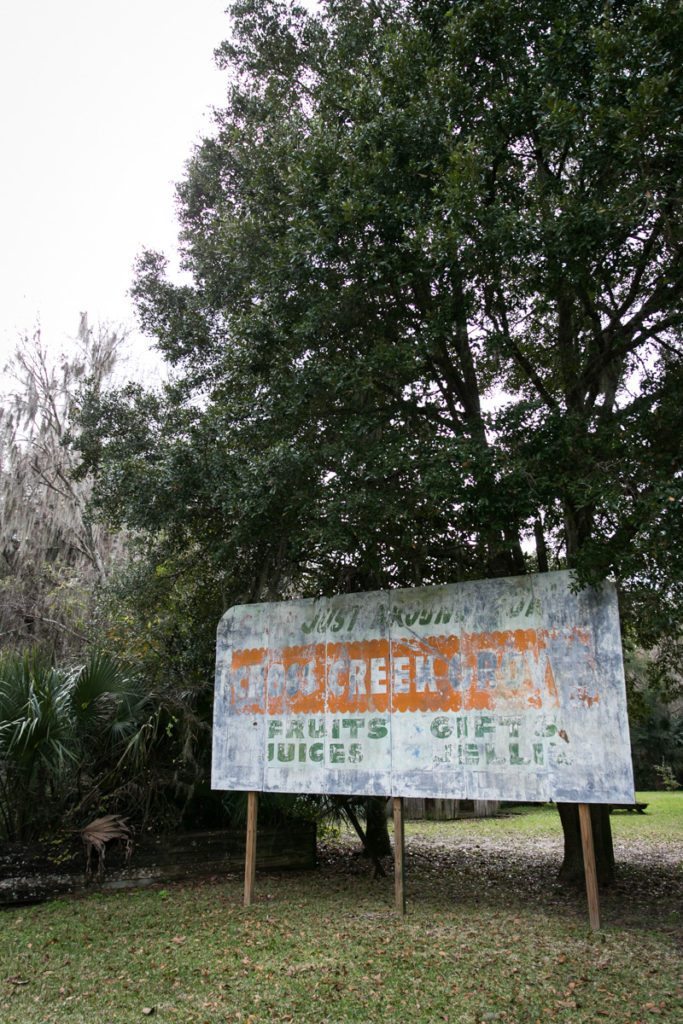 A fading sign selling citrus
