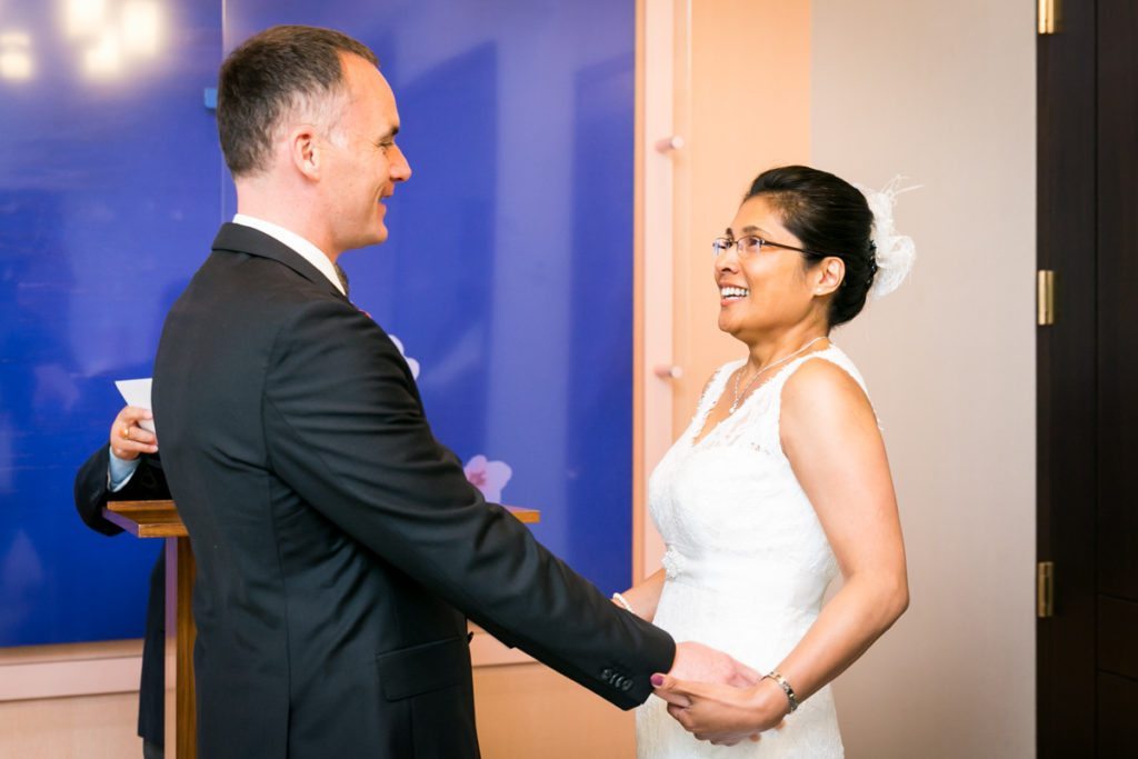 A couple getting married, by NYC City Hall wedding photographer, Kelly Williams