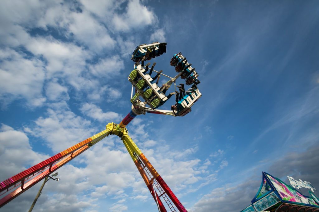 Amusement park rides at the county fair, by NYC photojournalist, Kelly Williams