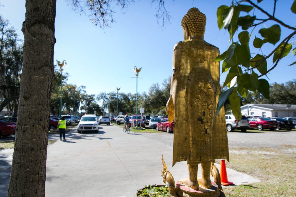 The parking lot of the Wat Mongkolratanaram, photographed by NYC photojournalist, Kelly Williams