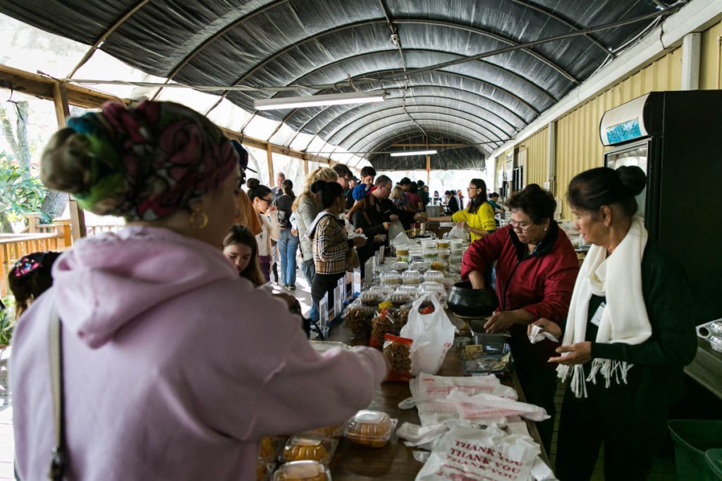 The Asian food market of the Wat Mongkolratanaram, photographed by NYC photojournalist, Kelly Williams