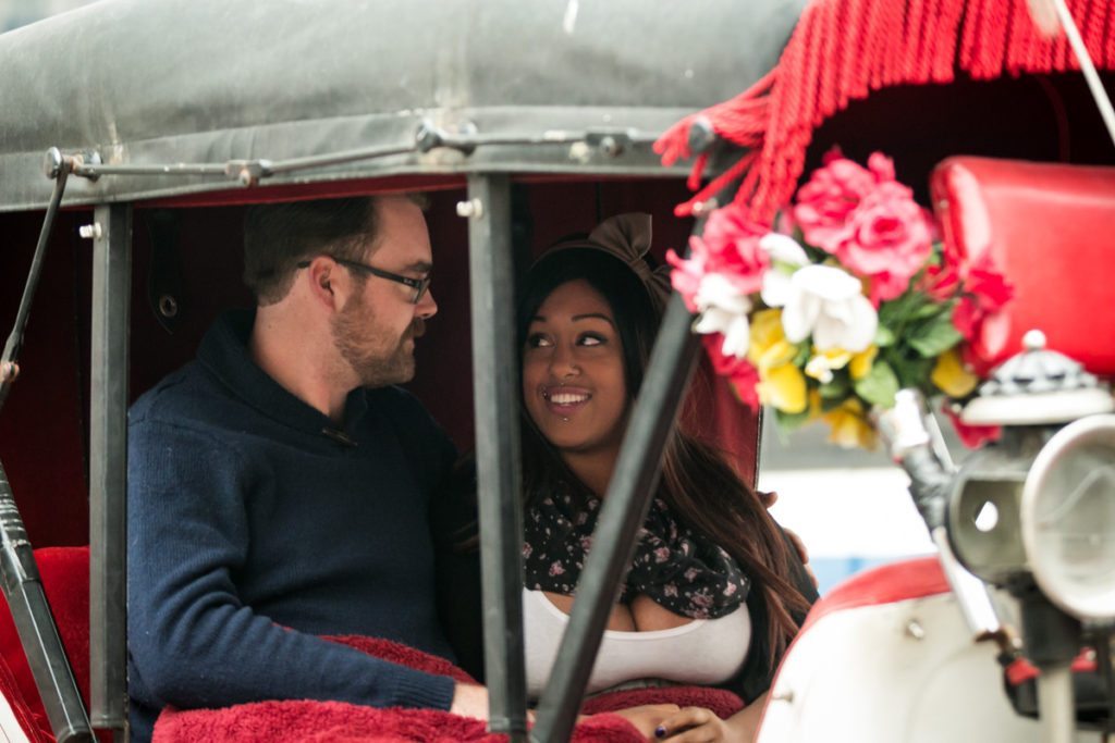 Brandon asks his girlfriend to marry him during a Central Park carriage ride, by NYC wedding photojournalist, Kelly Williams
