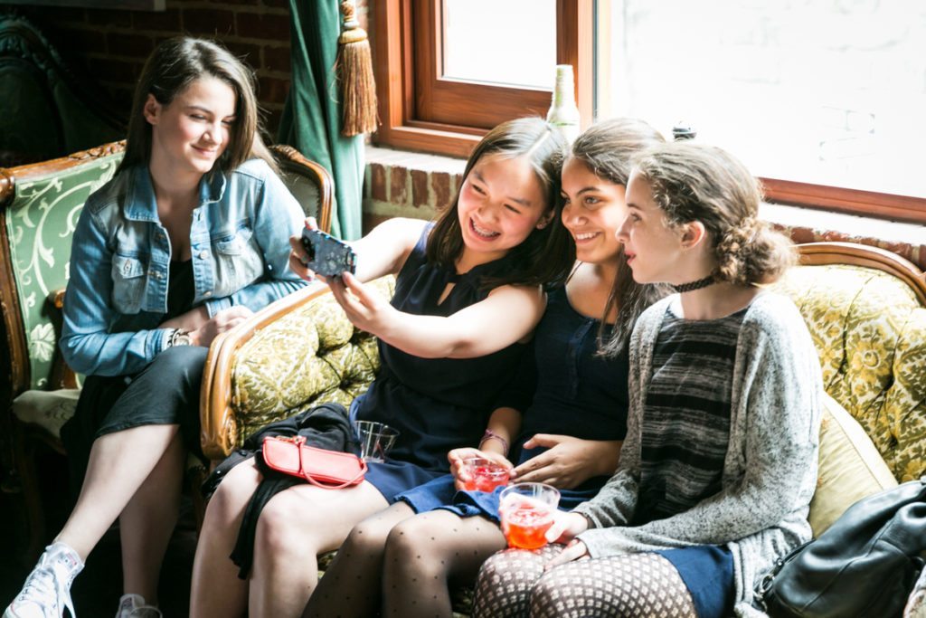 Kids having fun, by NYC bat mitzvah photographer, Kelly Williams