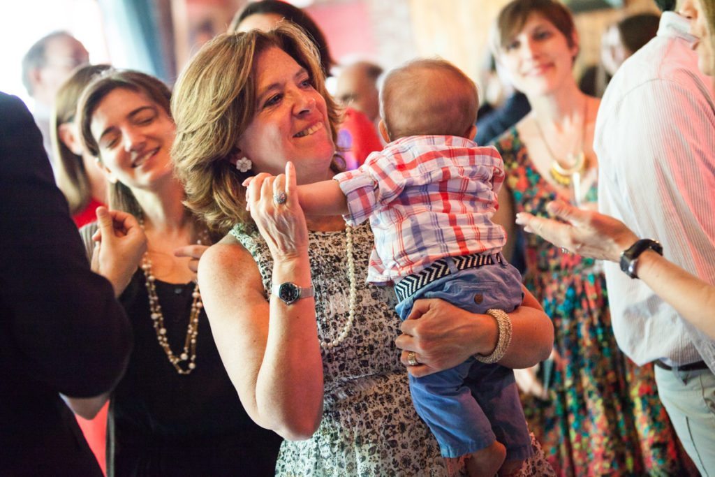 Guests having fun, by NYC bat mitzvah photographer, Kelly Williams