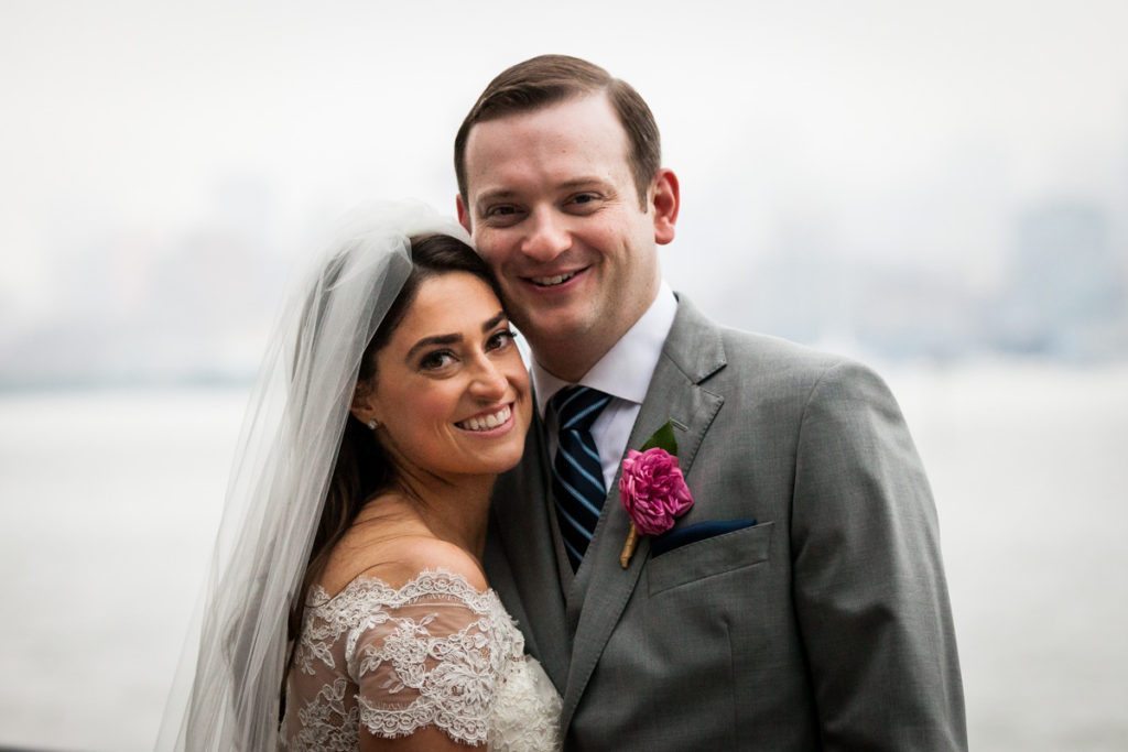 Portrait of the bride and groom by Hoboken wedding photojournalist, Kelly Williams