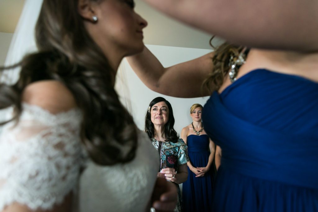 Bride getting ready, by Hoboken wedding photojournalist, Kelly Williams