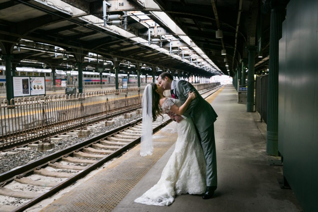 Portrait of the bride and groom inside the Hoboken train station, by Hoboken wedding photojournalist, Kelly Williams