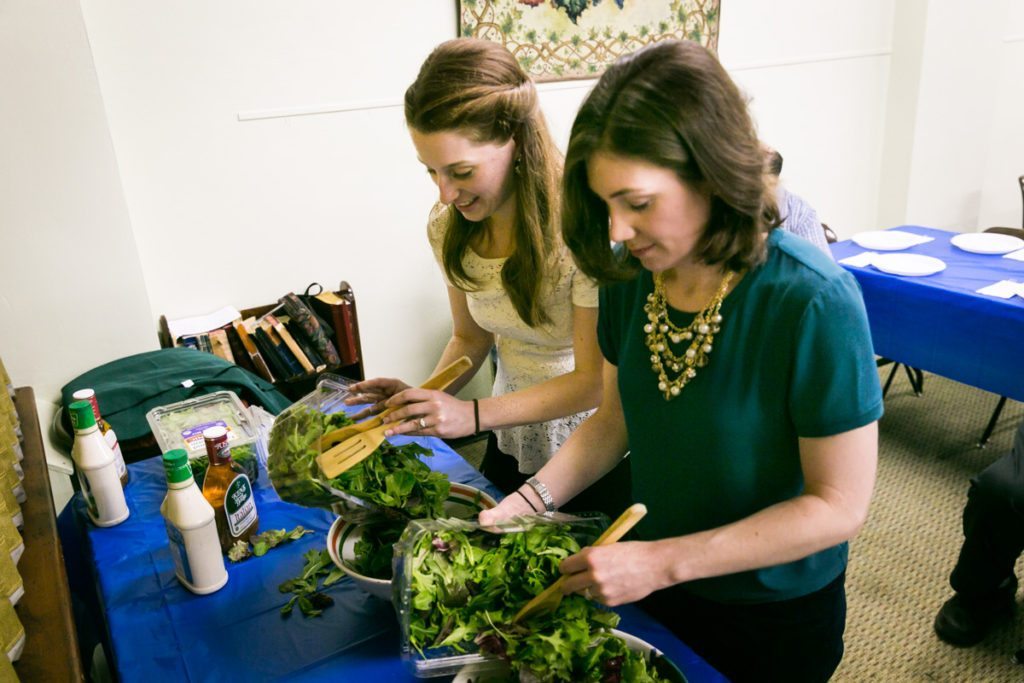 Candid photos from a Brooklyn rehearsal dinner to accompany an article on wedding tax deductions by NYC wedding photojournalist, Kelly Williams