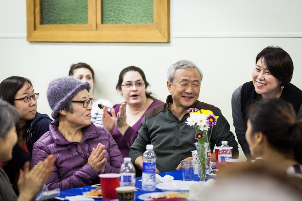 Candid photos from a Brooklyn rehearsal dinner to accompany an article on wedding tax deductions by NYC wedding photojournalist, Kelly Williams