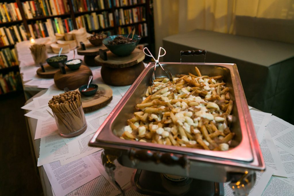 Poutine station from a Housing Works Bookstore wedding, by NYC wedding photojournalist, Kelly Williams