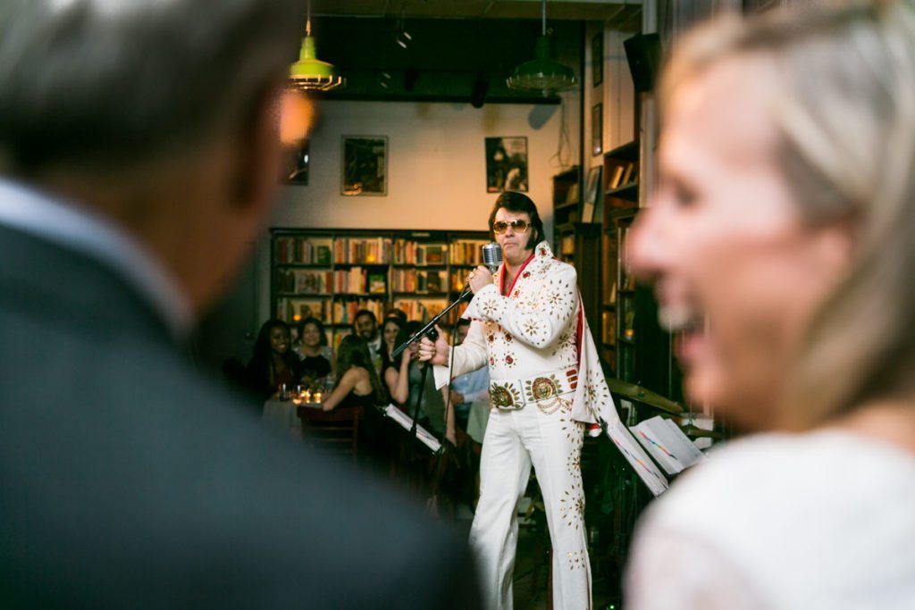 Elvis impersonator at a Housing Works Bookstore wedding, by NYC wedding photojournalist, Kelly Williams