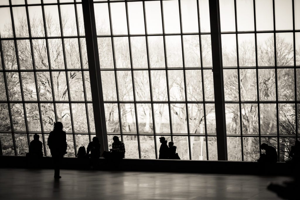 Candid shot of a museum goer at the Metropolitan Museum of Art, by NYC street photographer, Kelly Williams