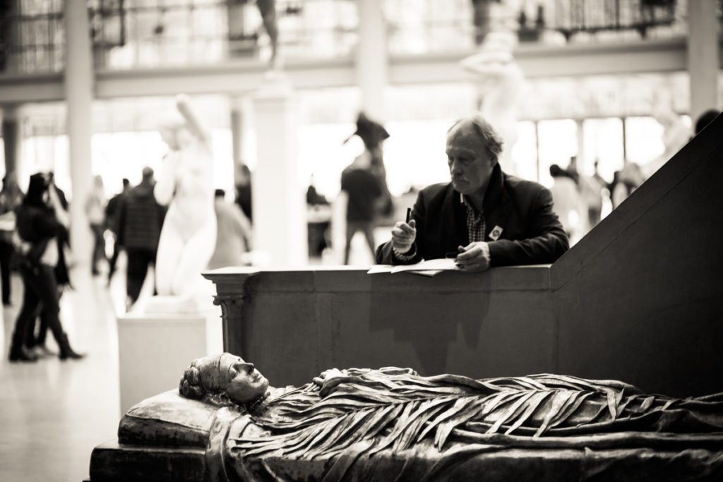 Candid shot of a museum goer at the Metropolitan Museum of Art, by NYC street photographer, Kelly Williams