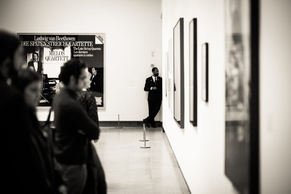 Candid shot of a museum goer at the Metropolitan Museum of Art, by NYC street photographer, Kelly Williams