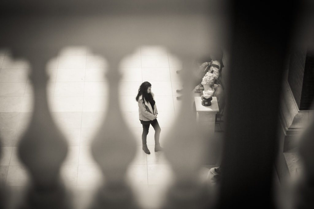 Candid shot of a museum goer at the Metropolitan Museum of Art, by NYC street photographer, Kelly Williams