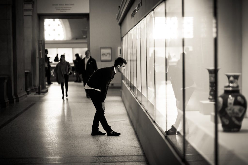 Candid shot of a museum goer at the Metropolitan Museum of Art, by NYC street photographer, Kelly Williams