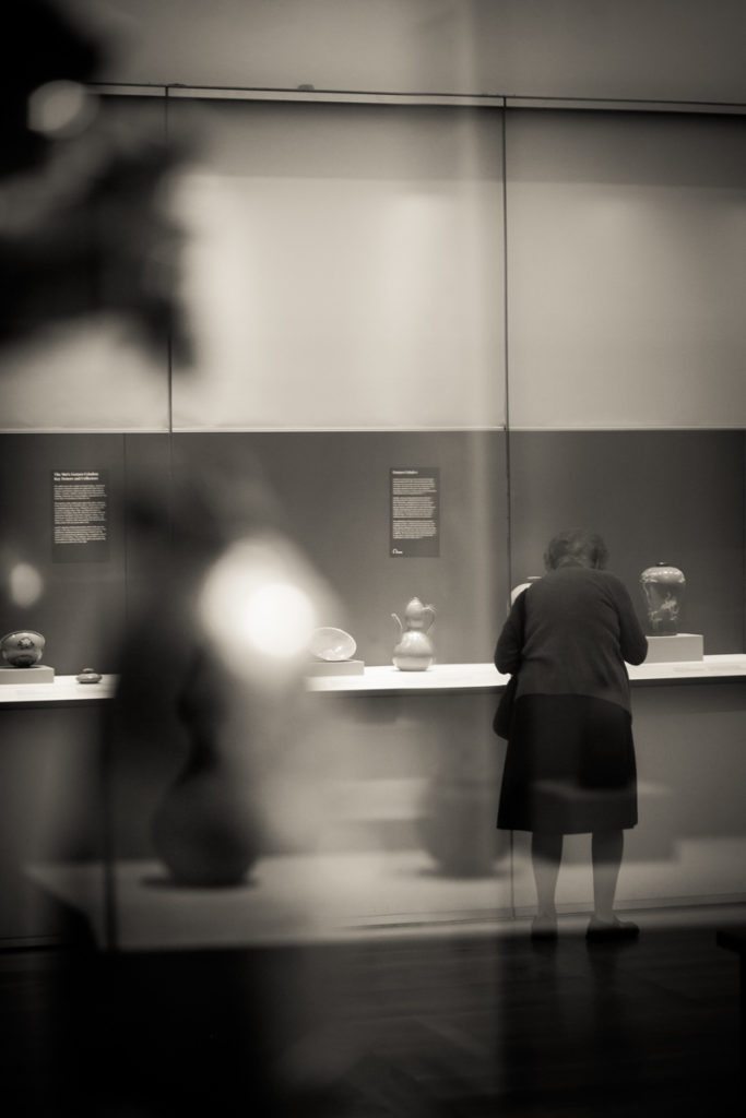 Candid shot of a museum goer at the Metropolitan Museum of Art, by NYC street photographer, Kelly Williams